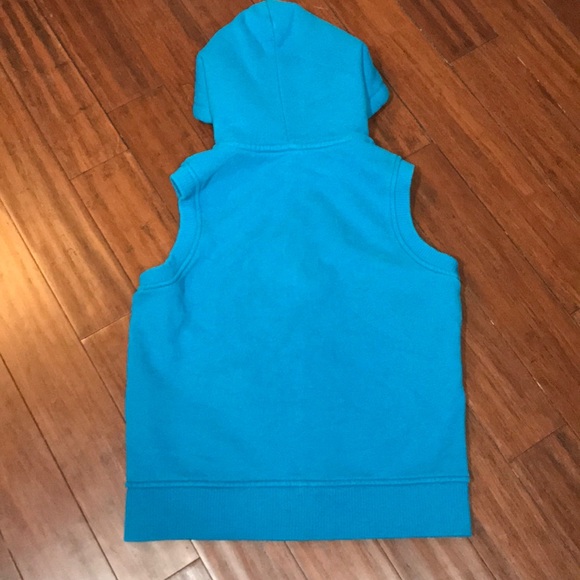 Sweater vest with faux fur lined hood. - Picture 5 of 7